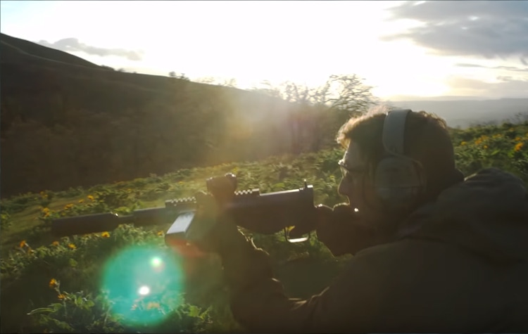 A suppressed Sten gun. 